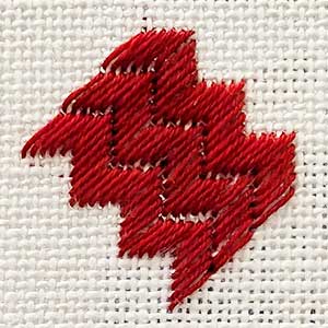 GESTICKTE ROTE FARBE